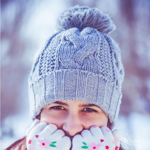 woman wearing a grey winter hat